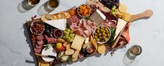 a table topped with lots of different types of food