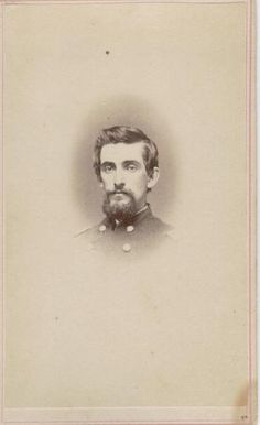 an old photo of a man with a beard