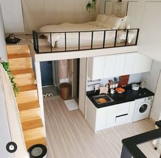 an overhead view of a small kitchen and bedroom