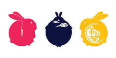 three different colored silhouettes of rabbits and an orange, one in the shape of a bag