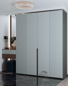 a white and grey closet with two doors next to a mirror on the wall in a room