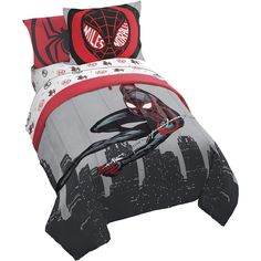 a spiderman bed set with red and black sheets