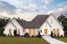 this is an artist's rendering of the front elevation of a house in white