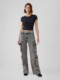 Fit: A full-length loose jean that's fitted on the waist & relaxed all the way down.  Fabric: 94% Cotton, 5% Recycled Cotton, 1% Stretch.  Stretch: Low Stretch Jeans.  Authentic denim with a soft & easy lived-in feel. ​ Rise: Mid Rise Jeans.  Look: A loose jean in a black acid wash.  Details: Zip fly, front slant pockets, back patch pockets, double-cargo pockets at sides.  Responsibly Made: This pair of jeans is part of our water-saving Washwell program.  Compared with conventional wash methods, Washwell uses at least 20% less water and has saved over a billion liters of water since 2016.  Our Mid Rise Jean has a 10" 25cm) rise.  Relaxed through the hip & thigh.  Loose, straight leg. ​ Full-length jean.  Hits below the ankle.  17" 43 cm) leg opening.  Inseam: Petite 27. 5" 70 cm), Short 29 Toddler Jeans, Jeans Look, Water Saving, Black Cargo, Loose Jeans, Cargo Jeans, Mid Rise Jeans, The Gap, Acid Wash