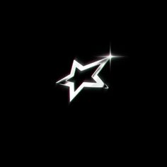 a white star on a black background with light coming from the top and below it