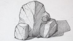 a pencil drawing of rocks on a white paper with one rock in the foreground