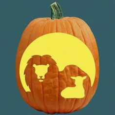 a carved pumpkin with two lions on it