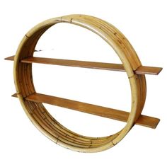 a circular wooden shelf with shelves on it