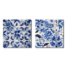 two blue and white tiles with flowers on them