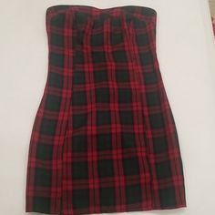 *Brand New W/ Tags *Red, Navy Blue, & Emerald Green Tartan Plaid Strapless Sweetheart Mini Dress (See 2nd Pic For Color) *Zipper Closure On The Back Of Dress *51% Cotton, 49% Polyester, Form Fitting *27 Inches Long Plaid Fitted Mini Dress For Party, Sleeveless Plaid Mini Dress For Date Night, Plaid Sleeveless Mini Dress For Date Night, Fitted Plaid Mini Dress For Date Night, Pink Velvet Dress, Red Ruffle Dress, Silk Sheath Dress, Strapless Ruffle Dress, Blue Emerald