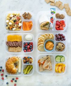 a plastic container filled with lots of different types of foods and veggie trays