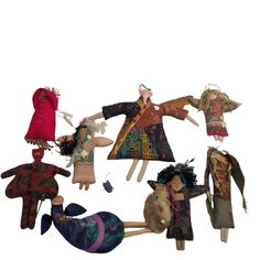 an assortment of dolls are arranged in a circle