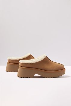 The UGG® New Heights Cozy Clog is crafted in a suede fabric with an EVA outsole and cozy UGGplush™ lining, a moisture-wicking textile made from a wool-rich blend but made to feel and wear like shearling. | UGG Women's New Hights Cozy Clog, Size 9, Brown Suede Fabric, Clogs Shoes, Womens Uggs, Chestnut, Moisture Wicking, Clogs, Autumn Fashion, Lookbook, Wool