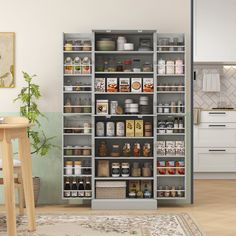 a large pantry with lots of food and drinks on it's shelves next to a dining room table