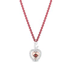 A sweet and delicious design from the Enchanted Disney Fine jewelry Collection inspired by Snow White, this red garnet and diamond apple necklace gives you a little taste of fairytale style. Fashioned in sterling silver A petite regal red garnet in a kite-shaped frame glistens at the center of a 10K rose gold heart detail. The open apple-shaped frame surrounds the centerpiece with shimmering diamonds, while a polished stem and leaf gleam atop. This 1/15 ct. t.w. diamond design suspends centered Fairytale Style, Apple Necklace, Enchanted Disney, Enchanted Disney Fine Jewelry, Disney Fine Jewelry, Disney Snow White, Apple Shaped, Rose Gold Heart, Fine Jewelry Collection