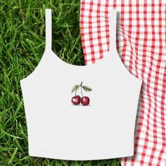 We love this fun, colorful Cherry design Baby Tank! This adult sized tank top is soft and super comfy and is made of 52% cotton and 48% polyester for a luxurious lightweight stretch. The designs are printed with DTF which delivers a vivid, detailed design with a textured feel. This tank is a perfect blend of coquette fashion and nostalgic Y2K vibes, making it a trendy addition to your casual wardrobe. Made with soft, comfortable material, it's ideal for everyday wear or for making a statement at White Y2k Vest Top, Y2k Letter Print Tank Top For Spring, Y2k Style Letter Print Tank Top For Spring, Y2k Cotton Tank Top With Letter Print, Fitted White Tops With Strawberry Print, Fitted White Top With Strawberry Print, Casual Red Tank Top With Letter Print, Casual Printed Crop Top Tank Top, Playful White Tank Top For Summer