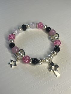 Designed with Care & Love, beautiful Jesus black, pink, pearls and diamonds stretchy Rockstar Princess bracelet. Pink And Black Bracelets, Black And Pink Bracelet, Black Pink Bracelet, Rockstar Bracelet, Rockstar Princess, Hot Pink Bracelets, Princess Bracelet, Bead Making, Pink Pearls