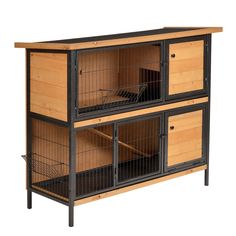 a large wooden cabinet with two cages on the front and one door open to reveal an animal cage