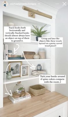 an open book shelf with some books on it and other things in the shelves below