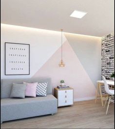 a living room filled with furniture next to a wall covered in letters and numbers on it