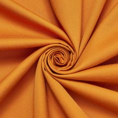 an orange fabric that is very close up