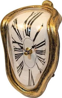 a white and gold clock with roman numerals