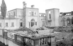 an old building with many windows and balconies