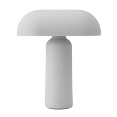 a white table lamp on a white background