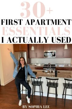 a woman standing in front of a kitchen counter with the words 30 + first apartment essentials i actually used