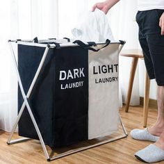 two laundry bags sitting next to each other on top of a wooden floor