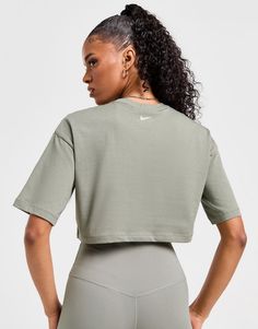 Upgrade your daily staples with this women's Swoosh Crop T-Shirt from Nike. In a Dark Stucco colourway, this tee is made with soft, lightweight cotton for lasting comfort. It features a ribbed crew neckline and short sleeves for a classic look, while the sleek cropped hem gives a boxy fit. Finished with a bold Nike Swoosh graphic stamped to the chest. Machine washable. | Our model is 5'7" and wears a size small. Dark Stucco, Chest Machine, Crop T Shirt, Nike Swoosh, Jd Sports, Crop Tshirt, Sport Fashion, Classic Looks, Crew Neckline