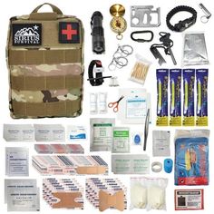 the contents of an emergency kit are neatly organized and ready to be packed into bags