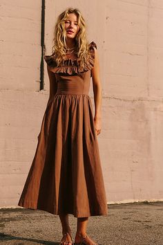 Effortlessly ethereal, this sweet midi from our free-est collection is the perfect romantic look. **Fit:** A-line silhouette with slim fit bodice **Features:** Exaggerated ruffled square neckline, billowy skirt design, tie-back closure **Why We | Ruffle It Up Midi Dress by free-est at Free People in Brown, Size: L Wild Fable Midi Dress, Feminine Ruffled Tea-length Midi Dress, Chic Tea-length Dresses For Brunch, Chic Tea-length Maxi Dress For Garden Party, Tea Length Ruffled Midi Dress For Garden Party, Garden Party Tea Length Midi Dress With Ruffles, Garden Party Tea-length Ruffled Midi Dress, Chic Fit And Flare Midi Dress Tea Length, Chic Fit And Flare Midi Dress