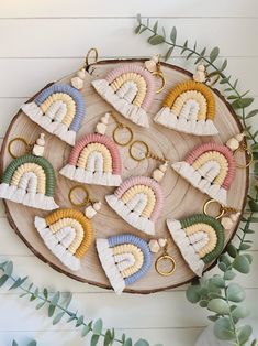 a wooden platter filled with lots of heart shaped key chains