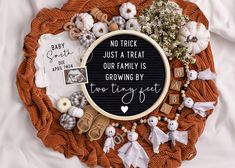 a cross stitch pattern with the words'no trick just a treat our family is growing by two tiny feet '