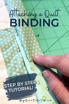 someone is cutting fabric with scissors on top of the sewing machine and text reads, attaching a quilt binding step by step