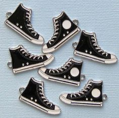 High top running shoe silver tone charms, in a zinc alloy metal and enamel. Perfectfor bracelets, pendants, earrings, zipper pulls, bookmarks and key chains! Measurements: 30mm x 17mmHole Size: 2mm You will receive 5 charms. Need more? Just send us a message through the contact us form, instant chat, or at mailto:info@bohemianfindings.com. Bulk pricing is available! All of our products are lead free and nickel safe. As they contain small parts, all items are for adult jewelry/craft making use on White Converse Style, Black And White Converse, White High Tops, Converse Style, White Converse, Charms Bracelet, Silver Shoes, Enamel Charms, Shoe Charms