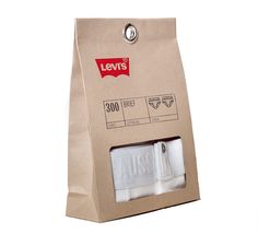 two rolls of white toilet paper in a brown bag with the label levi's on it