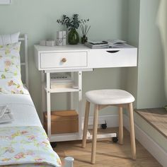 a bedroom with a bed, desk and stools in front of the mirror on the wall