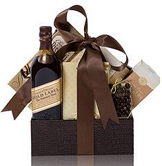 a bottle of wine and chocolates in a gift box