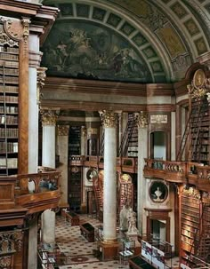 an ornate library filled with lots of books