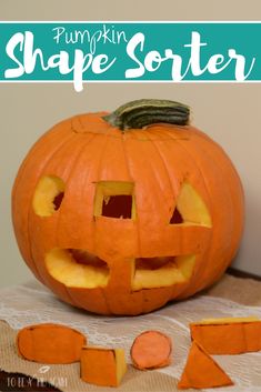 a pumpkin carved to look like a face and cut into smaller pieces with the words pumpkin shape sorter below it