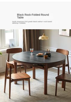 a round table with four chairs in front of it and the text black rock folded round table