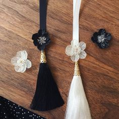 This is a Flower Ornament Tassel(Norigae) that goes well with Korean hanbok. It is beautifully decorated by hanging it on the front part of the Jeogori or the waist of the skirt/pants. You can decorate it not only in Hanbok, but also in modern dresses and bags. This hanbok accessory is great for special parties or various events. Dimensions: Total Length 9.25" (23.5cm) [ Ribbon Strap 3.9"(10cm) / Flower Ornament + Tassel 5.3"(13.5cm) ] The color of the items may look different depending on the m Korea Traditional, Modern Dresses, Korean Hanbok, Flower Ornaments, Korean Traditional, Modern Dress, Women's Costumes, A Flower, Skirt Pants