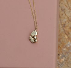 This Pendants item is sold by StudioBALADI. Ships from Israel. Listed on May 18, 2023 Yellow Gold Necklaces For Mother's Day Keepsake, 14k Gold Necklace For Mother's Day Keepsake, Gold Schmuck, December Baby, Push Presents