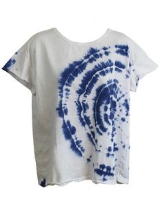 a white and blue tie - dyed shirt hanging on a clothes line with an image of a spiral in the middle