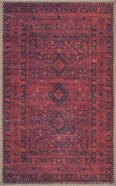 an antique rug with red and black colors