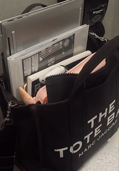 an open black bag sitting on top of a counter