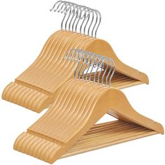 three wooden hangers with metal clips on them