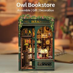 an owl book store is shown with the words owl bookstoree assembleable gift decoration